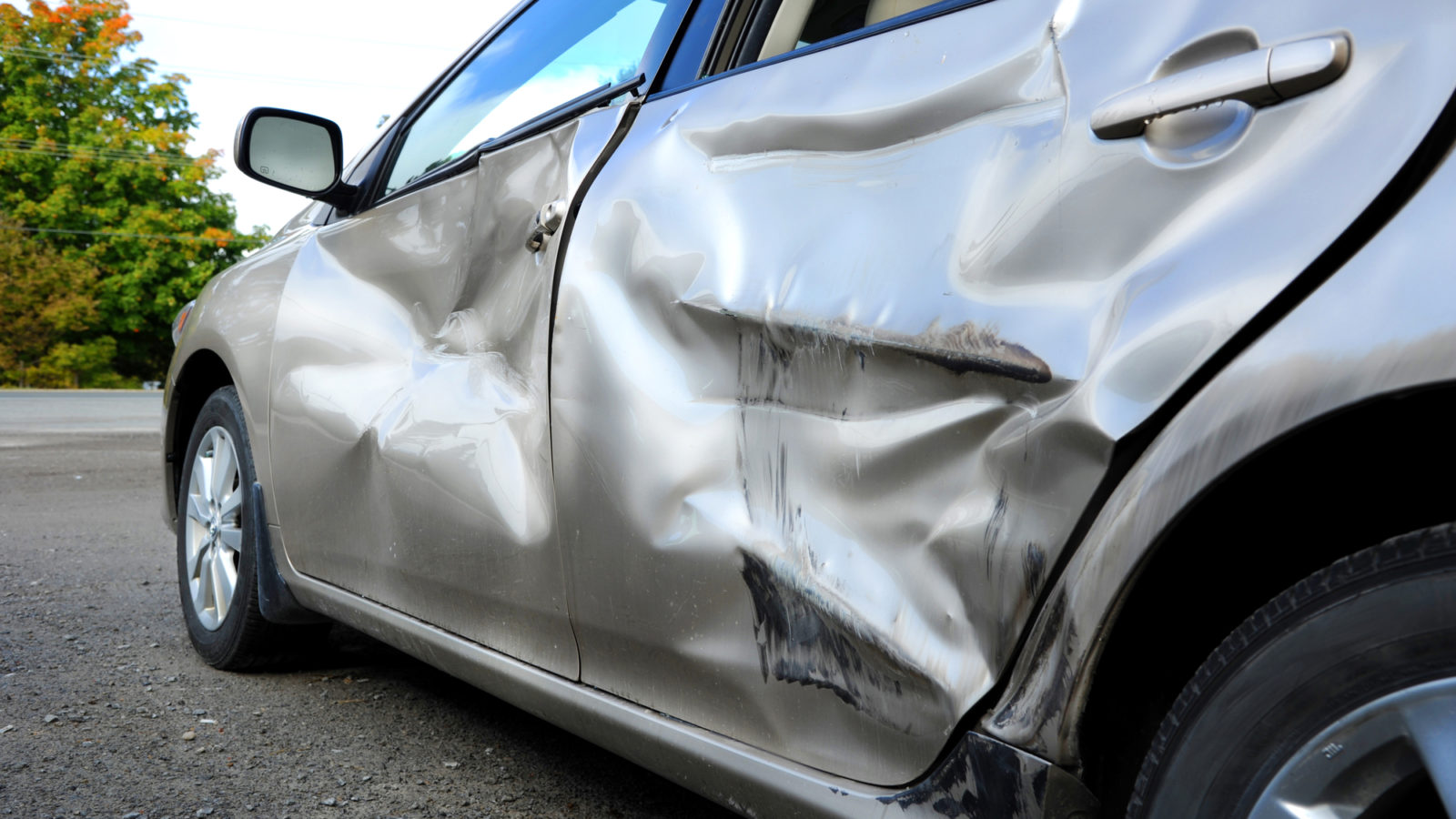 hit and run accident lawyer Scottsdale Arizona - damaged car side panel